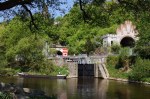 ship and railway tunnel exits below weilburg